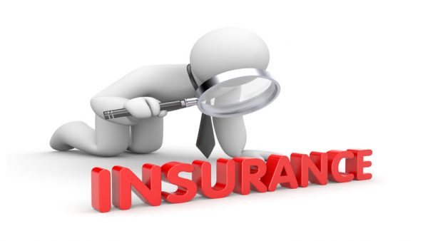 White cartoon figure looking at the word insurance with a magnifying glass